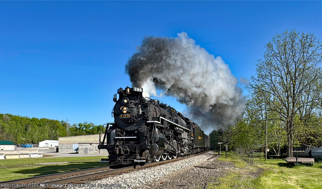 NKP 765 passes through town.